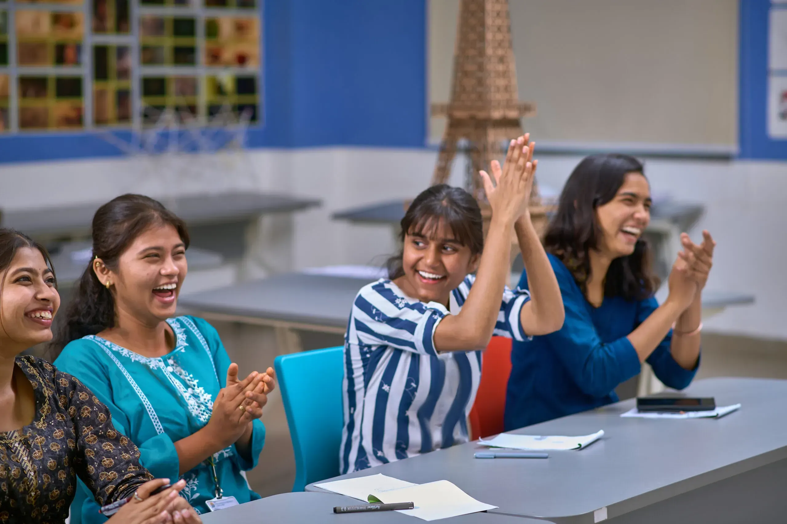 Students collaborating at a table
